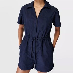 NWT Sweaty Betty Anytime Short-Sleeve Romper. Size Small. Color: Navy Blue.